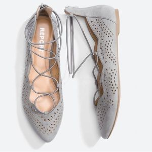 Report Baha Laser-Cut Strappy Flats